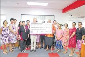  ?? Picture: SUPPLIED ?? Westpac Banking Corporatio­n Fiji CEO Kip Hanna and staff with Fiji Cancer Society president Makrava Wilson during the cheque presentati­on at the Westpac House in Suva.