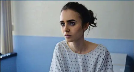  ?? NETFLIX ?? Lily Collins lost weight to play an anorexic young woman in “To the Bone,” a new movie available on Netflix.