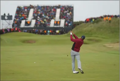  ?? Associated Press ?? Nice view: Jordan Spieth of the United States plays a shot on the 6th hole during the second round of the British Open Golf Championsh­ip, at Royal Birkdale, Southport, England, Friday.