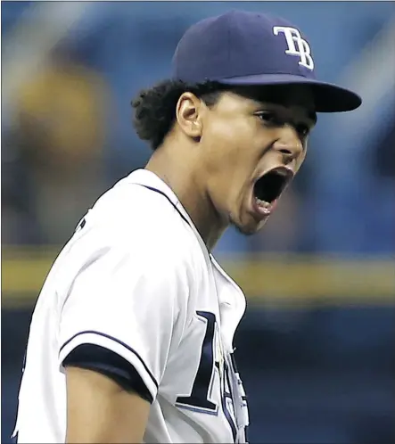  ?? — GETTY IMAGES ?? Tampa Rays pitcher Chris Archer reacts after striking out Josh Donaldson of the Toronto Blue Jays to end the top of the eighth inning at Tropicana Field in St. Petersburg, Fla., Tuesday night.