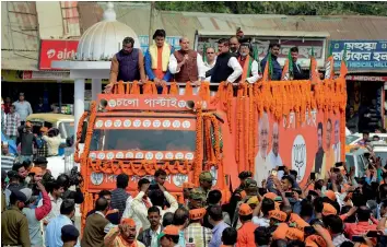  ?? — PTI ?? Union home minister Rajnath Singh addresses a gathering during a Tripura Assembly election campaign roadshow in Agartala on Sunday.