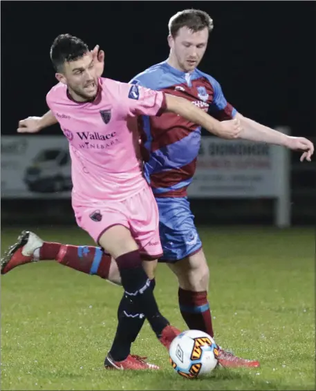  ?? Picture: Ger Hore ?? Wexford striker Aaron Dobbs - on loan from Shamrock Rovers - is shepherded away from goal by United’s Luke Gallagher.