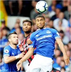  ??  ?? Everton’s Morgan Schneiderl­in (left) and Dominic Calvert-Lewin and in action with Huddersfie­ld Town’s Steve Mounie (centre) during the English Premier League match at Goodison Park in Liverpool, Britain in this Sept 1 file photo. — Reuters photo
