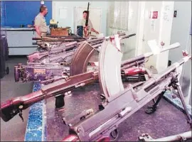  ?? Rick Rycroft Associated Press ?? ABOUT 640,000 guns were surrendere­d in Australia through a buyback program in 1996 and 1997 after the worst mass shooting in the country’s history.