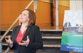  ?? MARIAN DENNIS – DIGITAL FIRST MEDIA ?? Sarah Kerins, principal at St. Aloysius Parish School, talks about the process of moving to the new building located at 844 North Keim Street.