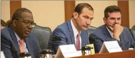  ?? PHOTOS BY LYNDA M. GONZÃLEZ / AMERICAN-STATESMAN ?? State Sen. Charles Schwertner, R-Georgetown (center), and fellow committee members listen to testimony during the hearing on Tuesday. Much of the attention focused on the school marshal program.