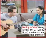  ??  ?? Getting In Tune: Haley (Megia) and JJ (Casey Moss) bond over their love of music.