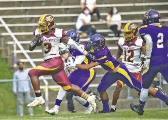  ?? STAFF PHOTO BY TROY STOLT ?? Tyner running back Jeremiah Sawyer breaks free for a touchdown during Friday night’s game at Central. Sawyer scored five touchdowns in the Rams’ 42-18 victory to open the season.