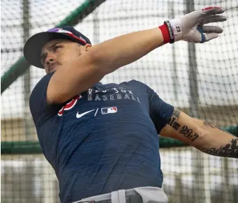  ?? BIllIe WeISS / BoSTon red Sox / geTTy IMageS fIle ?? WORK CUT OUT FOR HIM: Michael Chavis takes batting practice during a Red Sox spring training workout on March 4 at JetBlue Park in Fort Myers, Fla. Chavis is battling for a spot on the big league roster.