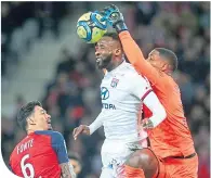  ??  ?? Moussa Dembele (centre) in action for Lyon