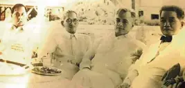  ??  ?? Aguinaldo (right) and Manuel Quezon (beside him), who had fought a bitter campaign for the Commonweal­th presidency, reconciled on July 21,1941 during the birthday of Sen. Daniel Maramba (beside Quezon).