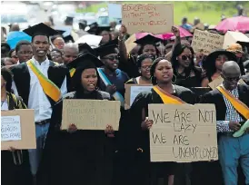  ?? /Sibongile Ngalwa/Daily Dispatch ?? Walk to work: Eastern Cape unemployed graduates march to the premier’s office in 2017 to demand jobs. A new survey reveals that joblessnes­s in SA has since worsened.