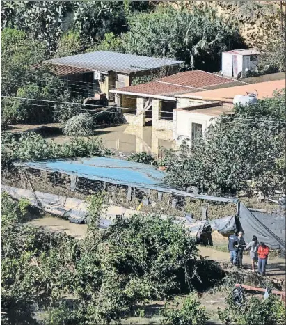  ?? ALESSANDRO FUCARINI / AFP ?? La casa inundada donde falleciero­n nueve personas de una misma familia, en Casteldacc­ia, cerca de Palermo