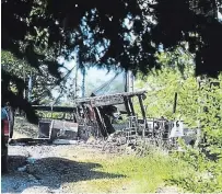  ?? TODD VANDONK TORSTAR ?? This is all that remains of a house at 827 Kimberly Dr. in Ennismore after a fire on Sunday. The home belonged to a mother and three young girls who have lost everything, including their dog, Darcy, who died in the blaze. A GoFundMe campaign has been launched to help raise money for the family.