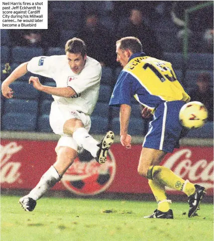  ??  ?? Neil Harris fires a shot past Jeff Eckhardt to score against Cardiff City during his Millwall career... he would later become a Bluebird
