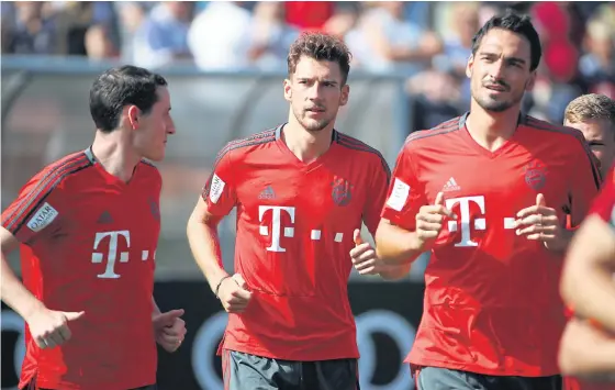  ??  ?? Bayern Munich’s Leon Goretzka, centre, and teammates during a training session.