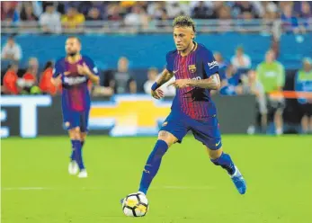  ?? FOTO: AFP ?? Neymar bei seinem letzten Spiel für Barcelona – ein Testkick (!) in Miami (!!) gegen Real Madrid (!!!).