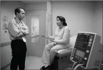  ?? Associated Press ?? ■ Irma Hendricks, right, talks with her physician Peter P. Reese, MD at Hospital of the University of Pennsylvan­ia on Oct. 6 in Philadelph­ia. Hendricks received a kidney transplant from a donor with hepatitis C, and took medication­s after surgery that...