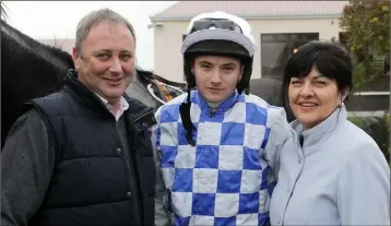  ??  ?? John and Anna Berry with their son, John, who finished third on Give Us A Hand in the 2.35 p.m. race. John Snr. also had the winner of the 1.25 p.m. race in Abbey Magic.