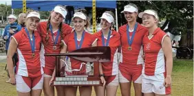  ?? Pictures: MARK CARRELS ?? PROUD MARYS: St Mary’s school rowing team celebrate their victory the front lawns of the Halyards, after rowing to a gold medal performanc­e for the ninth consecutiv­e year at the Standard Bank SA Schools Boat Race on the Kowie at the weekend.