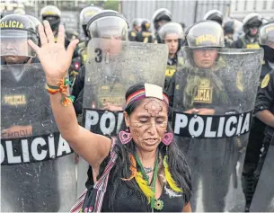  ?? AFP ?? People protest against the government of Peruvian President Dina Boluarte in Lima on Tuesday.