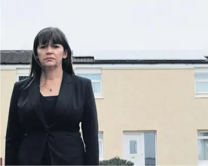  ??  ?? Concerns MSP Clare Haughey pictured outside one of the homes in her constituen­cy affected by the HELMS scandal