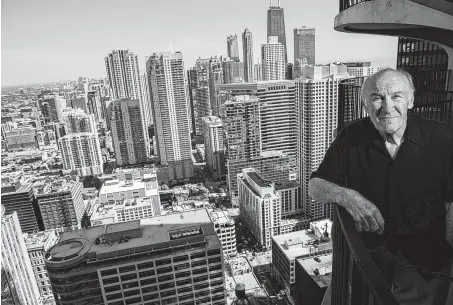  ?? Zbigniew Bzdak / Chicago Tribune ?? John Rukavina, 80, visits Marina Towers in Chicago. He has worked atop the city's tallest skyscraper­s for decades, including installing one of the new antennas atop the Willis Tower in March.