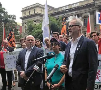  ?? PHOTO: CAROLINE SCHELLE/AAP ?? DRIVEN: TWU national secretary Tony Sheldon addresses a protest against the poor pay and conditions of food delivery drivers, in Melbourne yesterday.