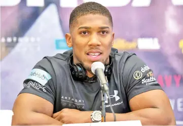  ?? — AFP photo ?? British boxer Anthony Joshua speaking during a news conference January 31, 2017 in Madison Square Garden in New York.