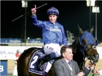  ?? — Photo by M.Sajjad ?? William Buick shows his delight after guiding Jack Hobbs to Dubai Sheema Classic victory.