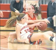  ?? GENE WALSH — FOR MEDIANEWS GROUP ?? Upper Dublin’s Jess Polin battles Plymouth Whitemarsh’s Abby Sharpe for a loose ball during their game on Saturday,