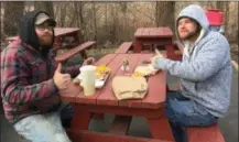  ?? PHOTOS BY MICHAEL GWIZDALA - MEDIANEWS GROUP ?? At left, Cory Felice, of Norwich and Chris Fisher, of Troy, enjoy Jack’s on opening day.