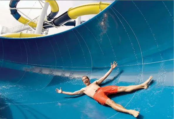  ?? CARNIVAL CRUISE LINE ?? Larger ships offer plenty of entertaini­ng activities, such as waterslide­s and spa treatments, to keep passengers busy on days between shore excursions.