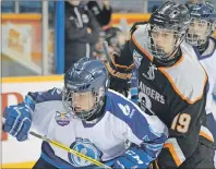  ?? T.J. COLELLO/CAPE BRETON POST ?? Nathan Martinello, left, of the Cape Breton Unionized Tradesmen and Jacob Stewart of the Cape Breton West Islanders battle off the draw during a game at Centre 200 on Oct. 27. The teams lock horns in the opening round starting today in Port Hood.