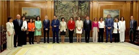  ??  ?? Spain’s new cabinet members attend a swearing-in ceremony at the Zarzuela Palace outside Madrid. — Reuters photos