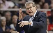  ?? KATHY WILLENS - THE ASSOCIATED PRESS ?? FILE - In this March 31, 2019, file photo, Connecticu­t coach Geno Auriemma gestures during the second half of a regional championsh­ip final against Louisville in the NCAA women’s college basketball tournament, in Albany, N.Y. Auriemma and UConn will be going for one last undefeated season in their American Athletic Conference farewell. The Huskies haven’t lost a league game since the AAC started in 2013. Not everyone is sad to see them go.