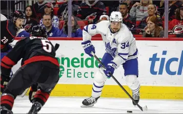  ?? KARL B DEBLAKER/ASSOCIATED PRESS ?? The Toronto Maple Leafs’ Auston Matthews (34) has scored an NHL-leading 58 goals this season, and, if he keeps his current pace, he could score as many as 70 before the season ends.