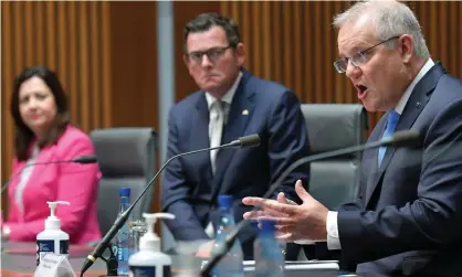 ?? Photograph: Sam Mooy/Getty Images ?? The Victorian and Queensland premiers, Daniel Andrews and Annastacia Palaszczuk, are pushing for the prime minister Scott Morrison to heavily cut internatio­nal arrivals.