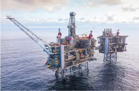  ?? STUART CONWAY/AFP/GETTY IMAGES FILES ?? An oil platform in BP’s Clair Ridge oilfield in the North Sea, off the coast of Scotland. Futures slipped below US$60 in London on Friday and ended the week down about 12 per cent, the worst showing since January 2016.