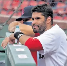  ?? NANCY LANE / BOSTON HERALD FILE ?? Red Sox designated hitter J.D. Martinez, watching from the dugout against the Toronto Blue Jays at Fenway Park on Sept. 6, said a hip problem, the shortened season, the coronaviru­s and the lack of in-game video analysis of his swing contribute­d to his problems this year.