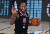  ?? MARK J. TERRILL — THE ASSOCIATED PRESS, FILE ?? Kawhi Leonard gestures in the second half of the Clippers’ conference semifinal against the Nuggets on Sept. 3.