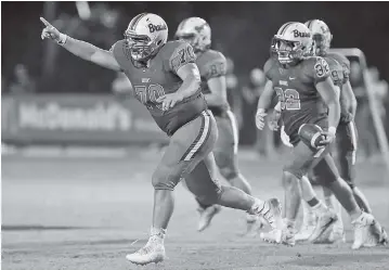  ?? STAFF PHOTO BY C.B. SCHMELTER ?? Northwest Whitfield’s Daniel Solorzano, pointing, celebrates after the Bruins recovered a Ridgeland turnover during their Region 6-AAAA game last month in Tunnel Hill. The Bruins host another region game tonight, against Heritage.