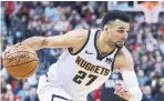 ?? VAUGHN RIDLEY GETTY IMAGES ?? Denver’s Jamal Murray had 19 points.