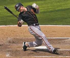  ?? Matt York / Associated Press ?? Giants outfielder Mike Yastrzemsk­i is daytoday after being hit on the left hand by a pitch against the A’s on Monday.