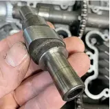  ??  ?? Camshaft lobe with pressed in H2 gudgeon pins.