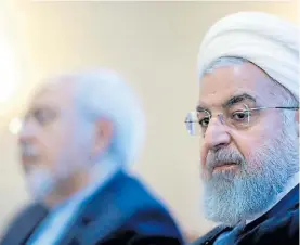  ?? AFP ?? Problemas. En primer plano, el presidente iraní, Hassan Rohani.