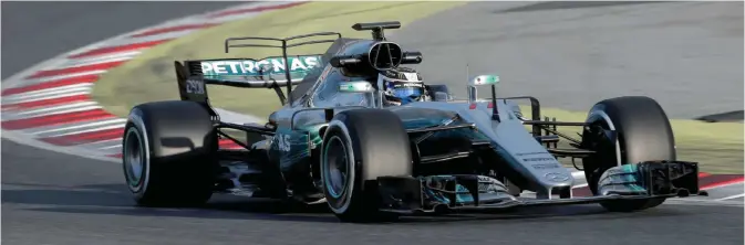  ?? — AP ?? BARCELONA: Mercedes driver Valtteri Bottas of Finland exits a curve while performing a race simulation during a Formula One pre-season testing session at the Catalunya racetrack in Montmelo, outside Barcelona, Spain, Tuesday.