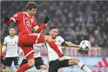  ?? AFP ?? Bayern Munich’s Thomas Mueller scores the second goal against Besiktas’ during the Uefa Champions League round of 16 first leg in Munich on Tuesday.