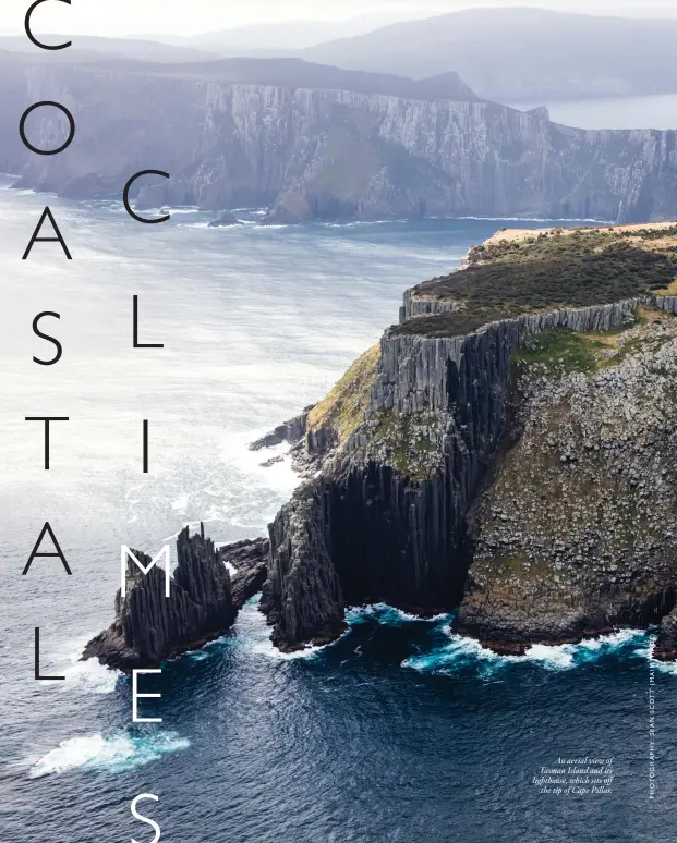  ??  ?? An aerial view of Tasman Island and its lighthouse, which sits off the tip of Cape Pillar.