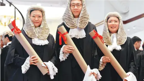  ?? Photo: Yik Yeung-man ?? Newly appointed senior counsel Frances Lok, Benson Tsoi and Queenie Fiona Lau after their admission ceremony yesterday.